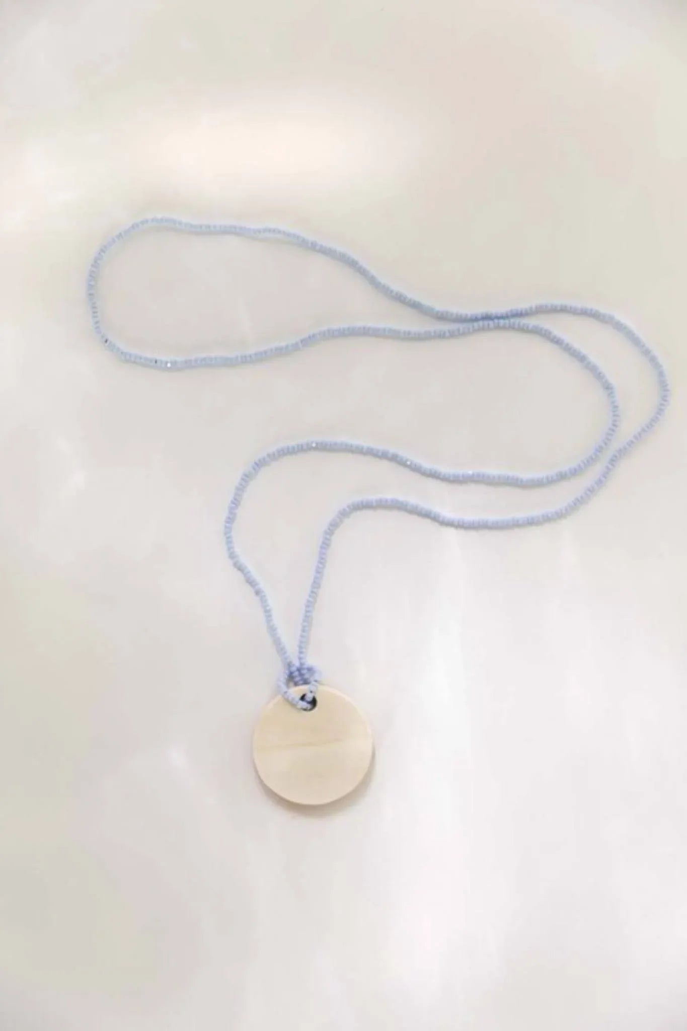 Bone Pendant Necklace Pale Blue